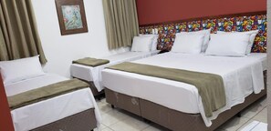 Standard Quadruple Room | Minibar, free WiFi, bed sheets - Pousada Jwf Barequeçaba (São Sebastião)