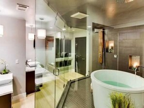 Combined shower/tub, hair dryer, towels, soap