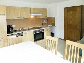 Oven, dishwasher, highchair, dining tables