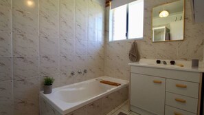 Bathtub, hair dryer