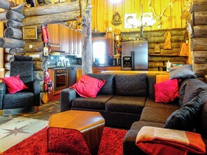A log cabin interior with a living room, kitchen, and dining area. - Teeritaivas by Interhome (Inari)
