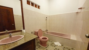 A bathroom with a sink, toilet, and bathtub. - Sam Moon's Hotel Angkor (Siem Reap)