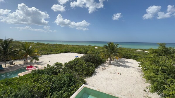 On the beach, sun loungers