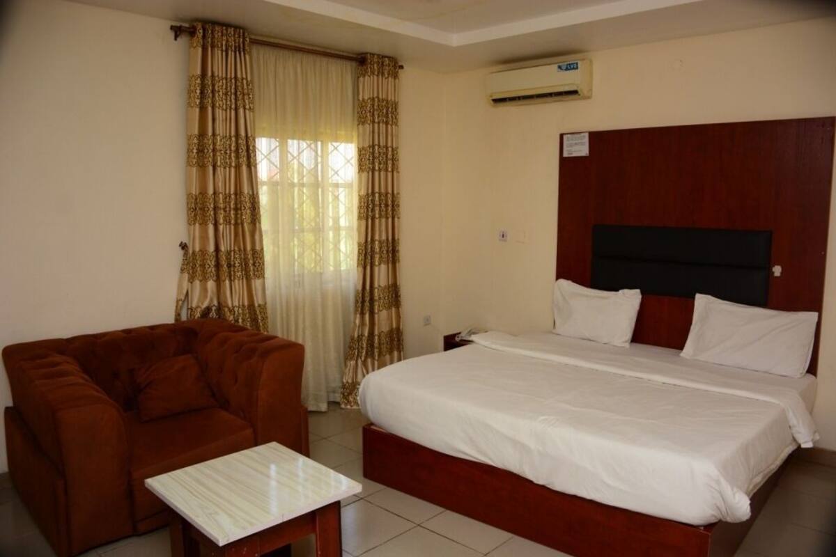 Desk, blackout curtains, bed sheets