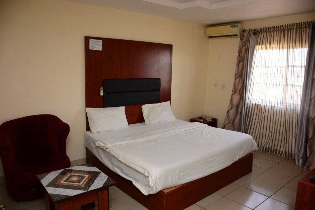 Desk, blackout curtains, bed sheets