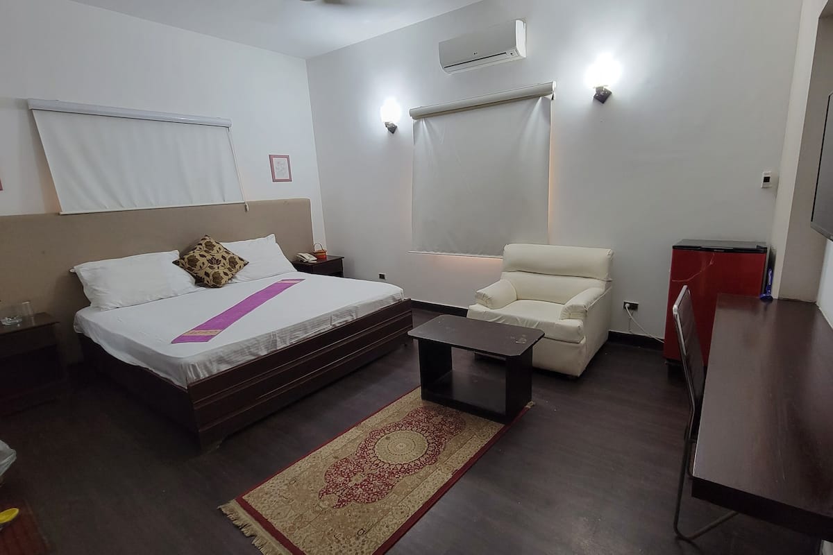 Habitación Deluxe | Tabla de planchar con plancha y wifi gratis 