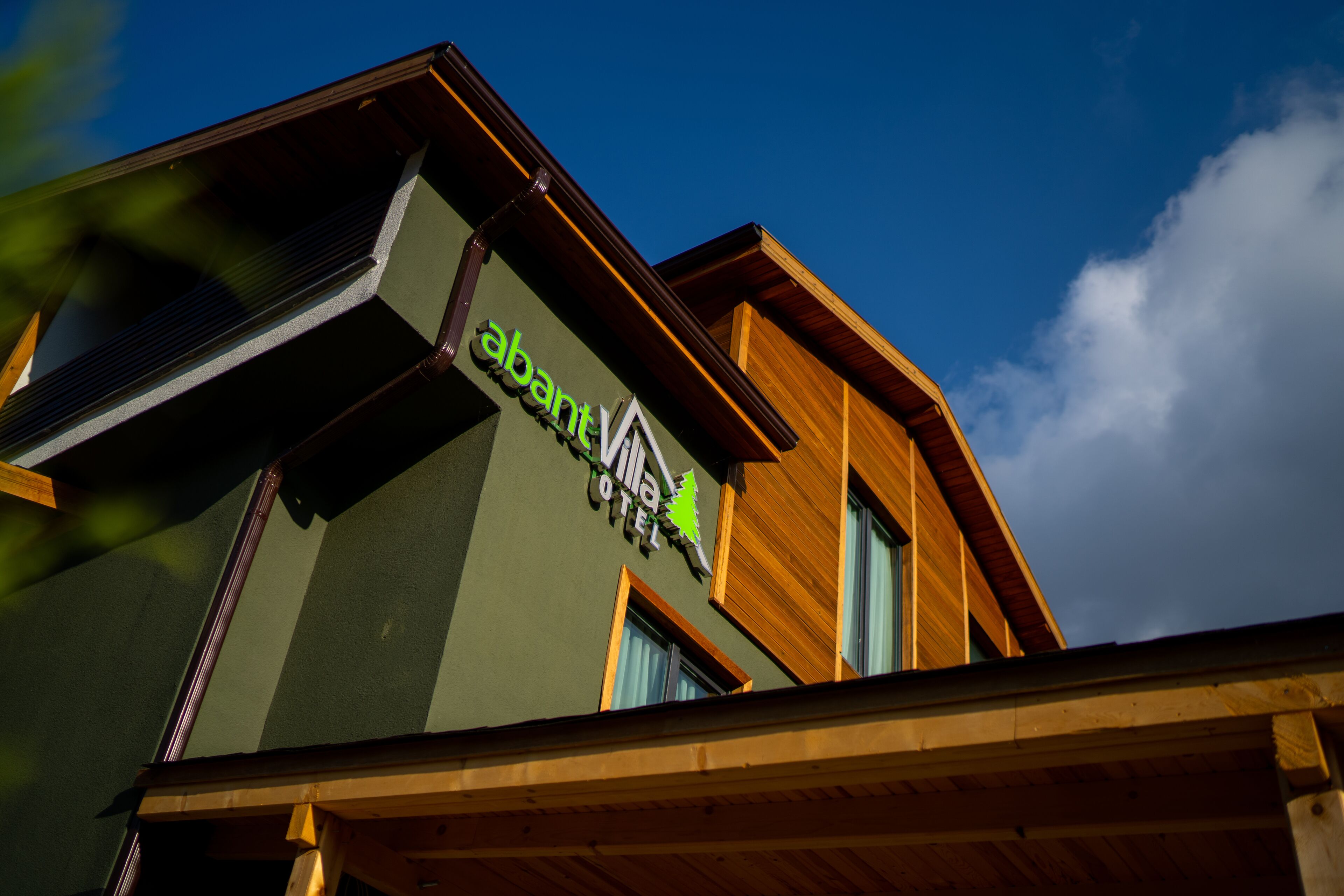 A modern building with a sign that reads "abant Villa Hotel".