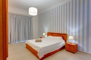 2 bedrooms, desk, laptop workspace, iron/ironing board