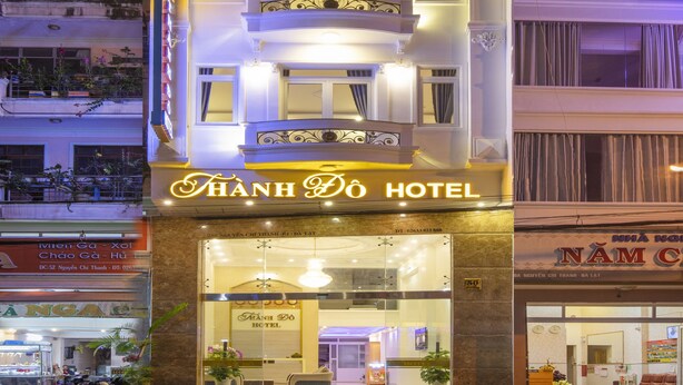 A hotel with a prominent sign reading "THANH DO HOTEL".