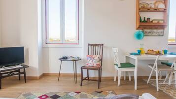 Apartment, 2 Bedrooms, City View | Living area | Flat-screen TV