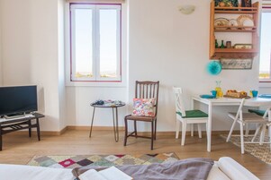 Apartment, 2 Bedrooms, City View | Living area | Flat-screen TV