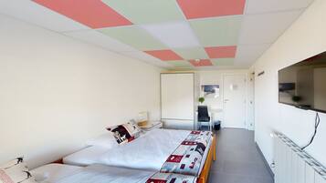 Habitación Deluxe con 1 cama matrimonial o 2 individuales | Escritorio, espacio para trabajar con laptop y insonorización