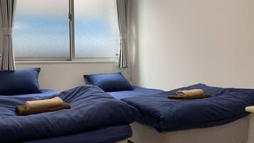 Kahden hengen standard-huone (kaksi sänkyä), tupakointi kielletty | Työpöytä, silitysrauta/-lauta, ilmainen Wi-Fi, vuodevaatteet