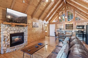 Flat-screen TV, fireplace, DVD player