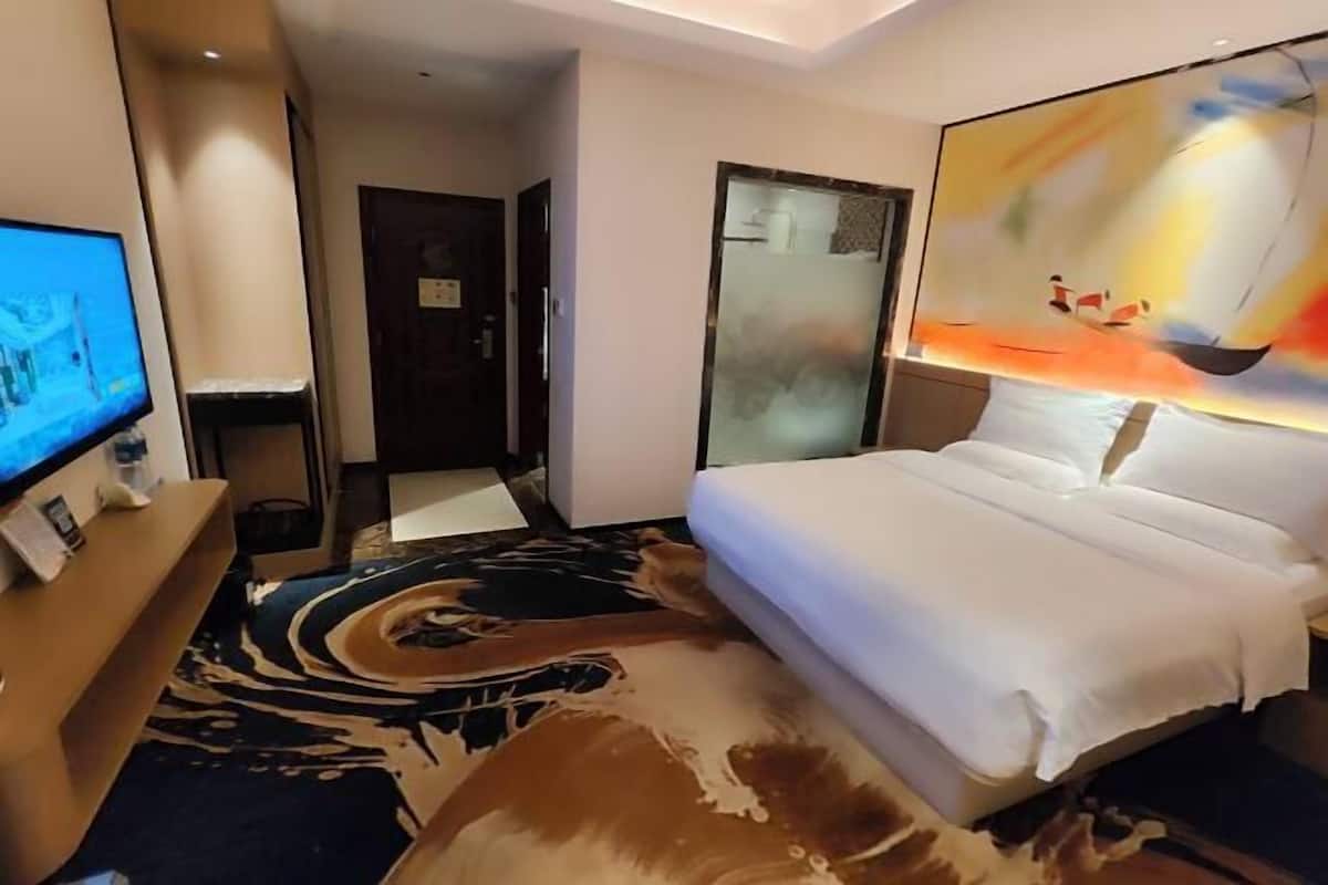 Blackout drapes, iron/ironing board, free WiFi, bed sheets