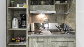 Deluxe Triple Room with Jetted Shower | Eget kjøkken