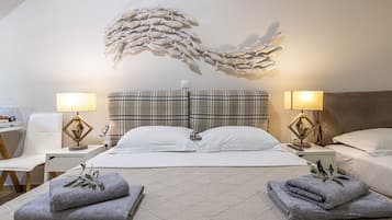 Deluxe Quadruple Room with Jetted Shower | 1 soveværelse, egyptiske bomuldslagner, premium-sengetøj, dundyner