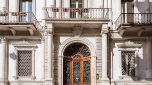 A historic building with ornate architectural details, including a central arched doorway, multiple balconies, and decorative columns. - LOFT IN THE CENTER OF BARI NEAR THE CHURCH OF SAINT NICHOLAS  (Bari)