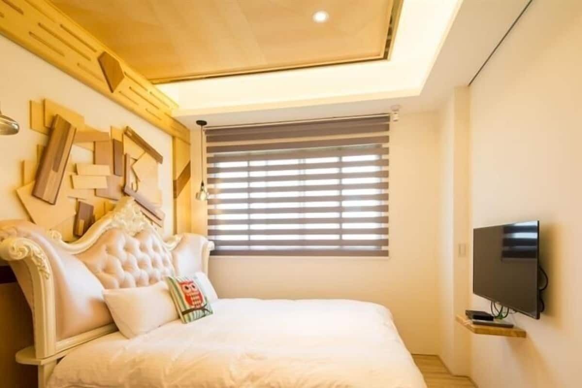 加大双人床房 | 免费 WiFi、床单