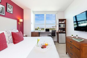 Iron/ironing board, travel crib, WiFi, bed sheets