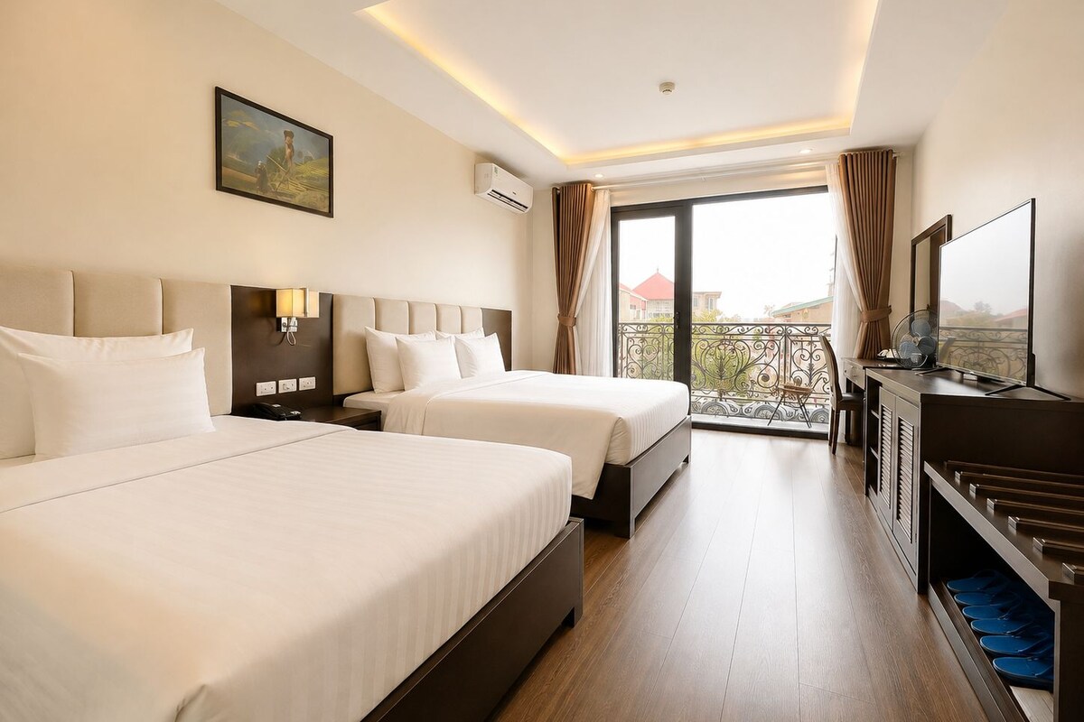 Family Suite, Balcony | Minibar, in-room safe, desk, laptop workspace