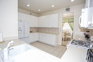 Family Villa, Multiple Bedrooms, Garden Area | Private kitchen | Stovetop, dishwasher, cookware/dishes/utensils