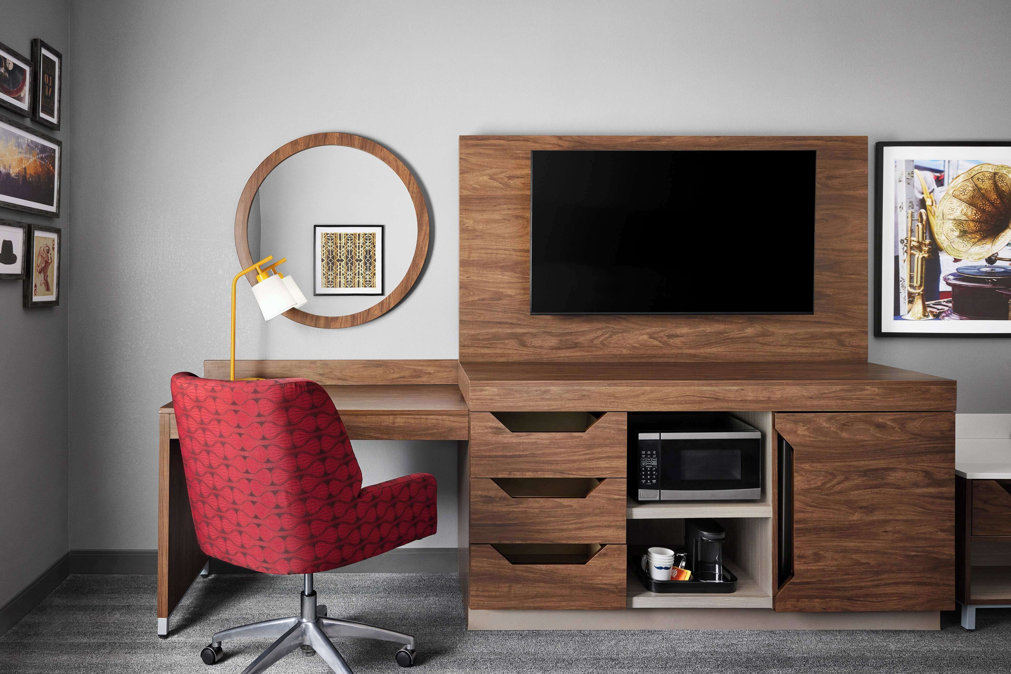 desk, laptop workspace, blackout curtains, iron/ironing board