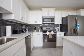 Family Apartment, Kitchen, Garden Area | Private kitchen | Stovetop, dishwasher, cookware/dishes/utensils
