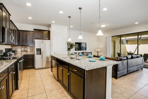 Family Townhome, Garden Area | Private kitchen | Stovetop, dishwasher, cookware/dishes/utensils