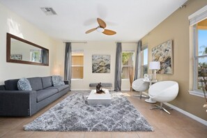 Family Villa, Multiple Bedrooms, Garden Area | Living room | Flat-screen TV, video game console