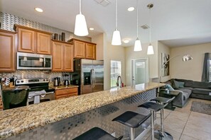 Family Townhome, Garden Area | Private kitchen | Stovetop, dishwasher, cookware/dishes/utensils