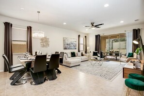 Family Townhome, Garden Area | Living room | Flat-screen TV, video game console - Ev7837ha - Windsor At Westside Resort - 6 Bed 5 Baths Unspecified (Kissimmee)