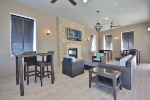 Family Townhome, Garden Area | Living room | Flat-screen TV, video-game console