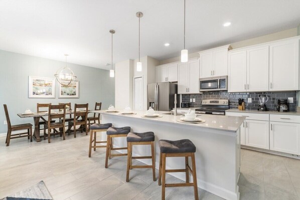 Family Townhome, Garden Area | Private kitchen | Stovetop, dishwasher, cookware/dishes/utensils - Vhc7852ha - Champions Gate Resort - 4 Bed 3 Baths Townhouse (Kissimmee)