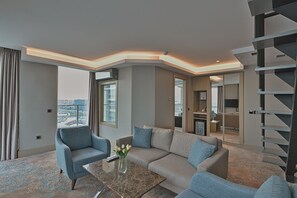 Studio Suite Executive, quang cảnh biển | Bộ đồ giường cao cấp, minibar, két bảo mật tại phòng, bàn 