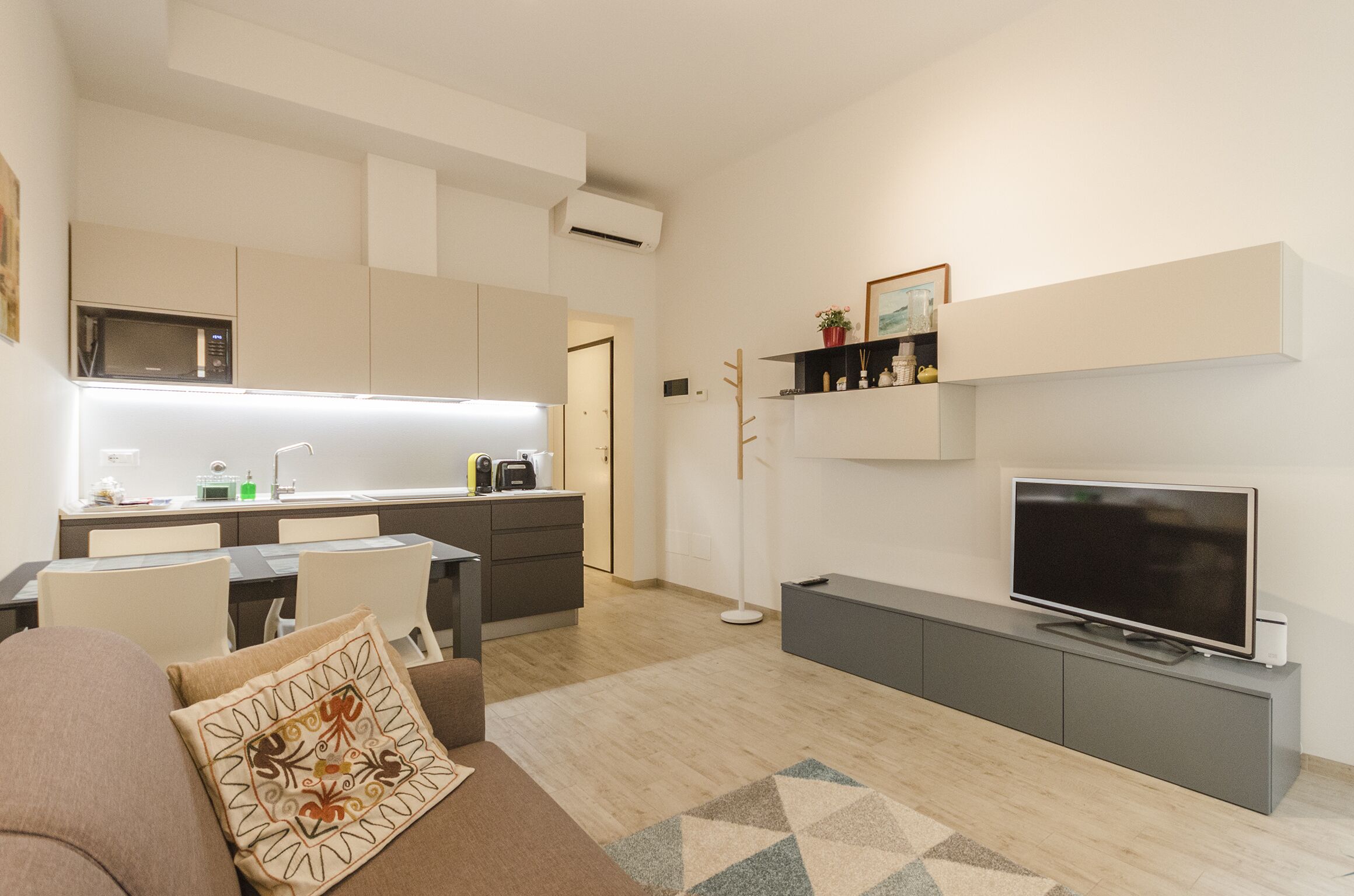 Apartamento, 1 quarto | Área de estar | TV de tela plana