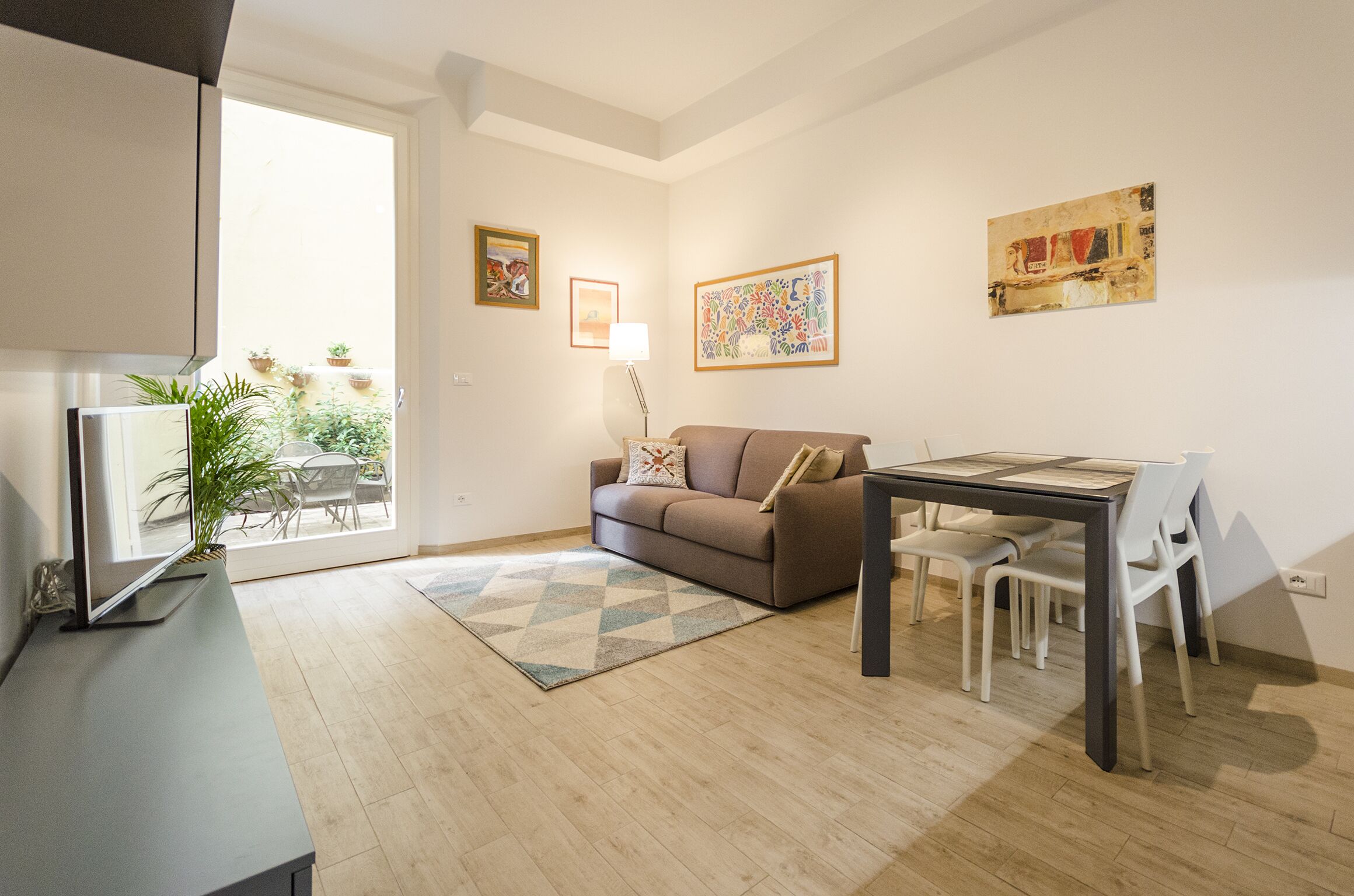 Apartamento, 1 quarto | Área de estar | TV de tela plana