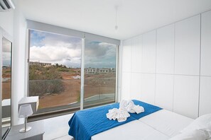 2 bedrooms, in-room safe, iron/ironing board, travel cot