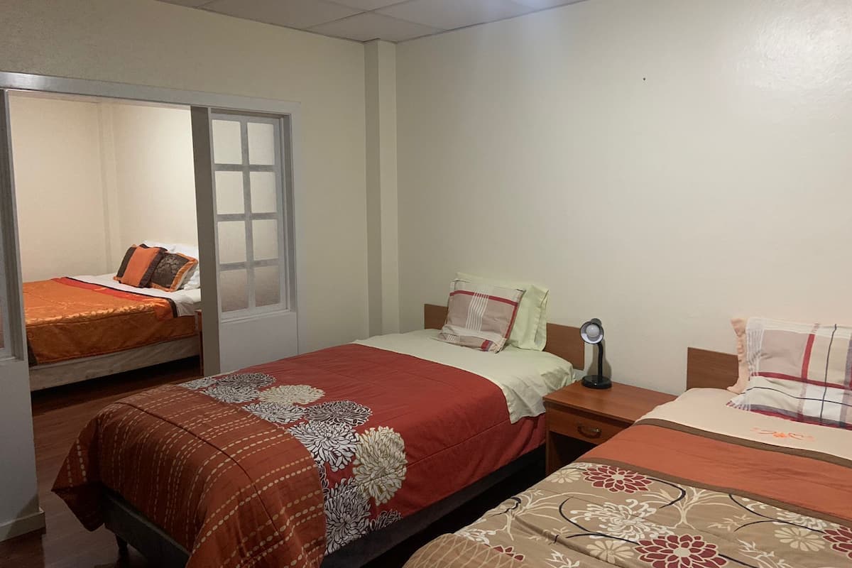 Family Triple Room, 3 Bedrooms | Desk, laptop workspace, WiFi (free), bed sheets