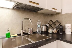 Appartement, 1 chambre | Cuisine privée | Grand réfrigérateur, four, plaque de cuisson, lave-vaisselle