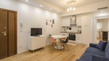 Apartment, 1 Schlafzimmer (Acqua) | Wohnbereich | Flachbildfernseher, Netflix, Streaming-Dienste
