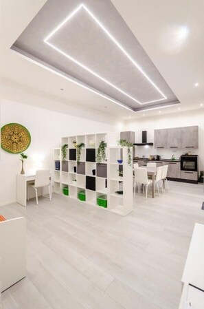 Apartment, 2 Bedrooms | Living area | 42-inch flat-screen TV with digital channels, TV - Dimora Santo Stefano (Bologna)