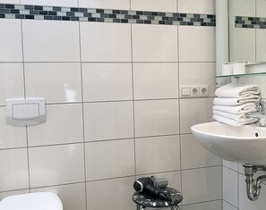 Apartment, 2 Bedrooms | Bathroom | Shower, towels, soap, toilet paper