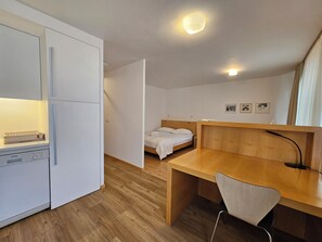 1 bedroom, desk, iron/ironing board, travel cot