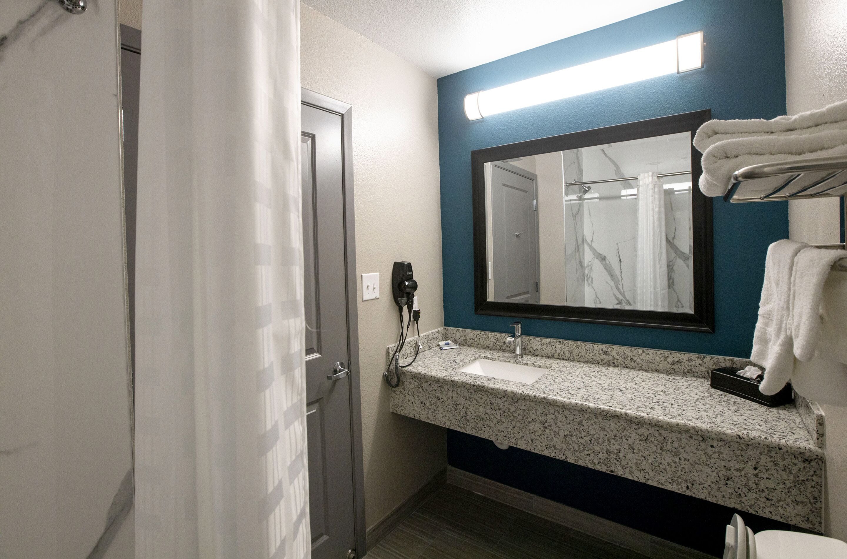 room, 1 king bed | bathroom | shower, hair dryer, towels
