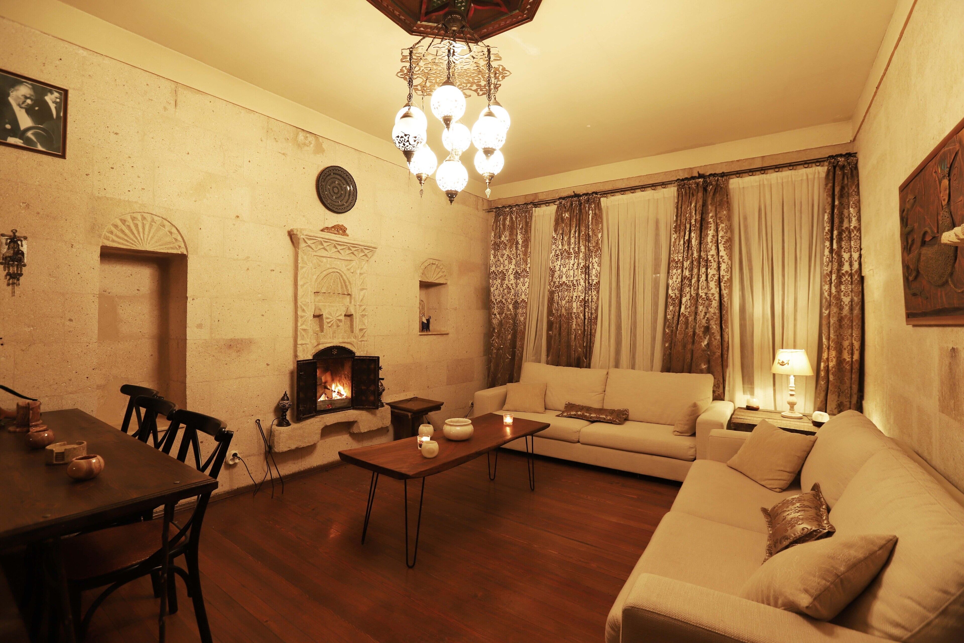 junior suite (sahmeran) | living area | 82-cm led tv with cable channels, tv