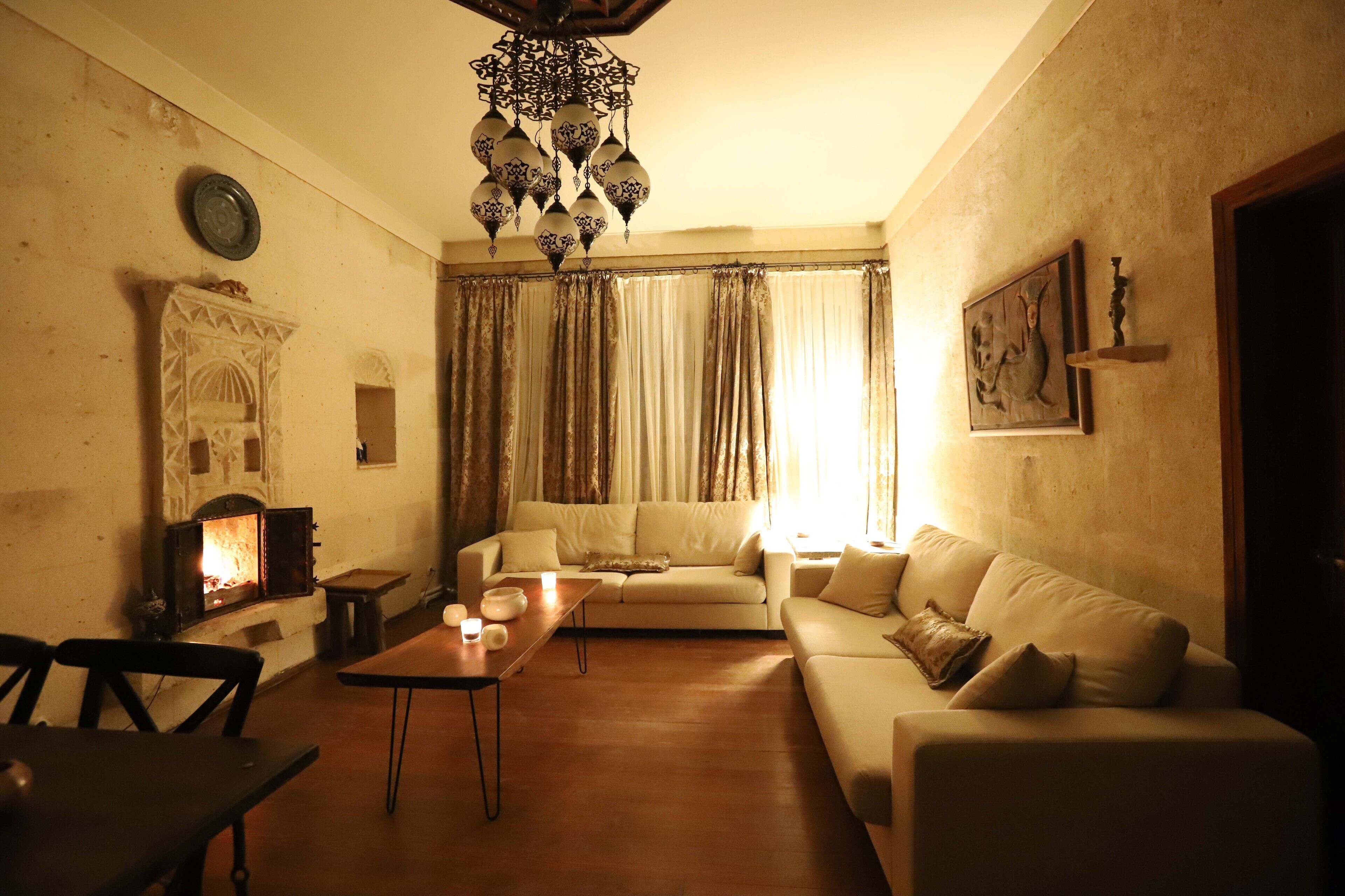 junior suite (sahmeran) | living area | 82-cm led tv with cable channels, tv