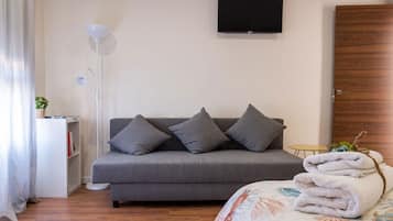 Habitació familiar | Escriptori, espai de treball apte per a portàtils i bressols