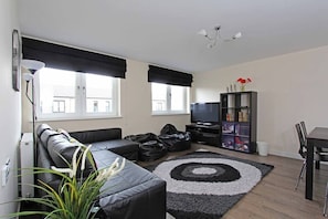 Apartment, 2 Bedrooms | Living area | Flat-screen TV