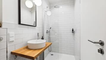 Suite M | Bathroom | Shower, designer toiletries, hair dryer, towels
